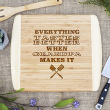 Load image into Gallery viewer, Everything Tastes Better When Grandpa Makes It Two Tone Cutting Board