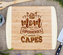 Load image into Gallery viewer, Mom Not All Superheros Wear Capes Two Tone Cutting Board