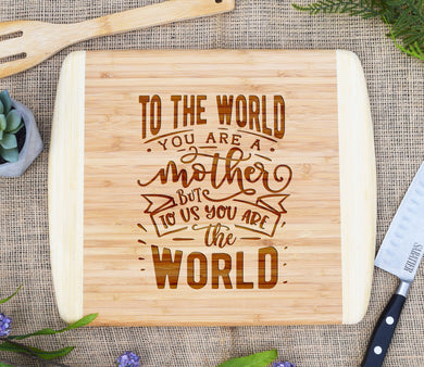 To The World You Are A Mother To Us You Are The World Two Tone Cutting Board